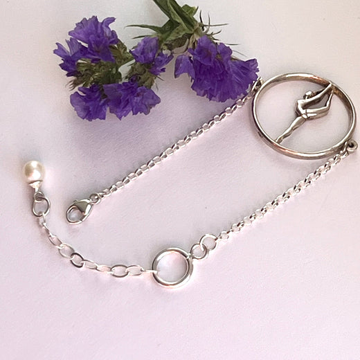 Pulsera de plata con gimnasta