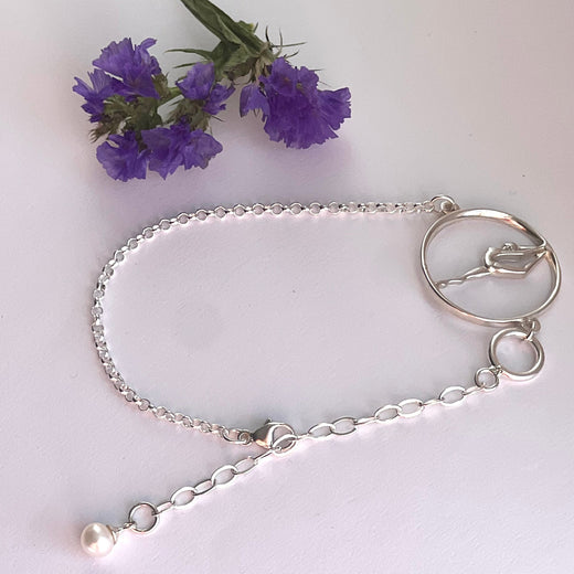 Pulsera de plata con gimnasta
